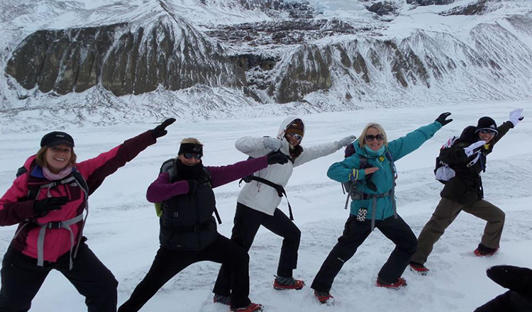 posing on a glacier